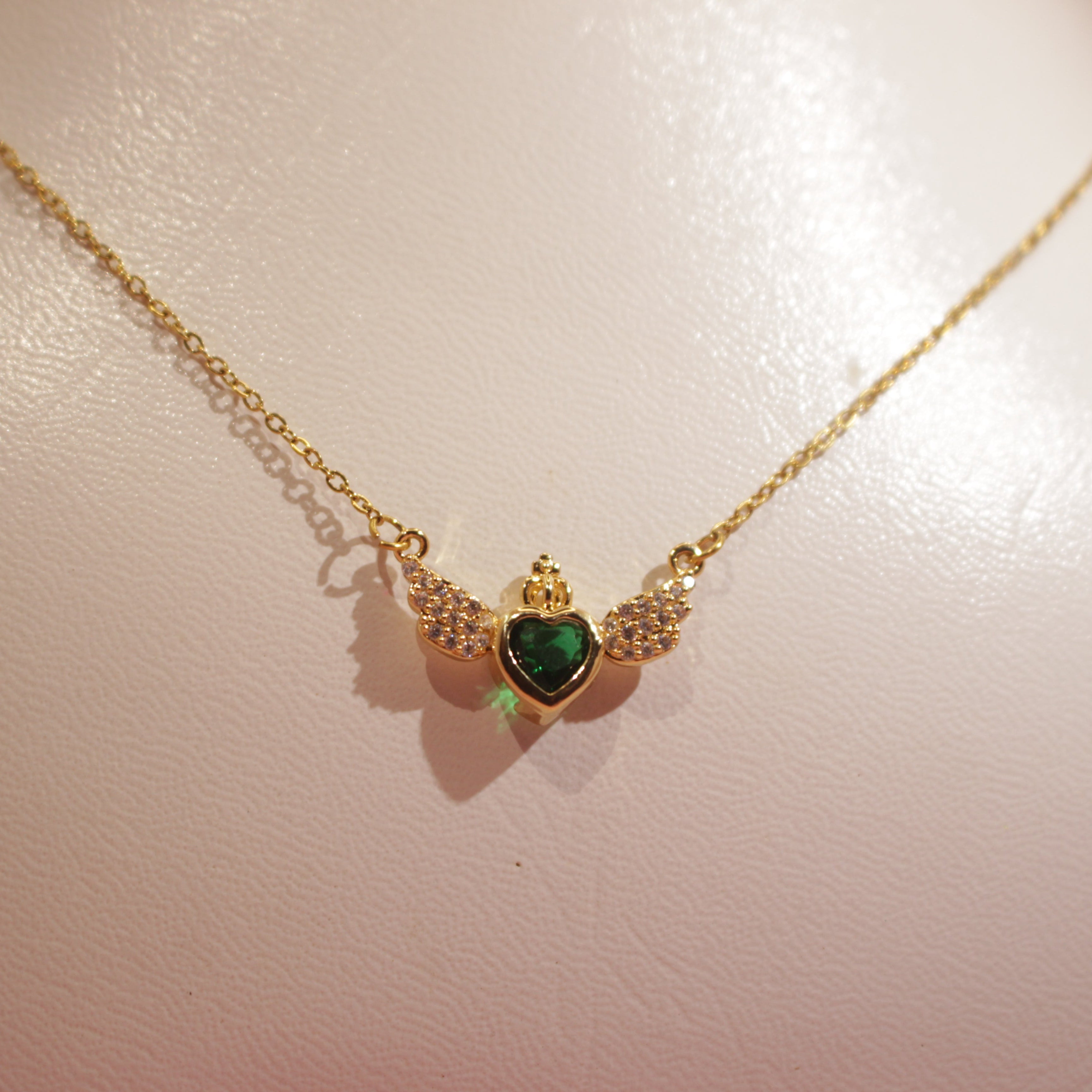 Emerald Winged Embrace Pendent Gold-Plated Elegance