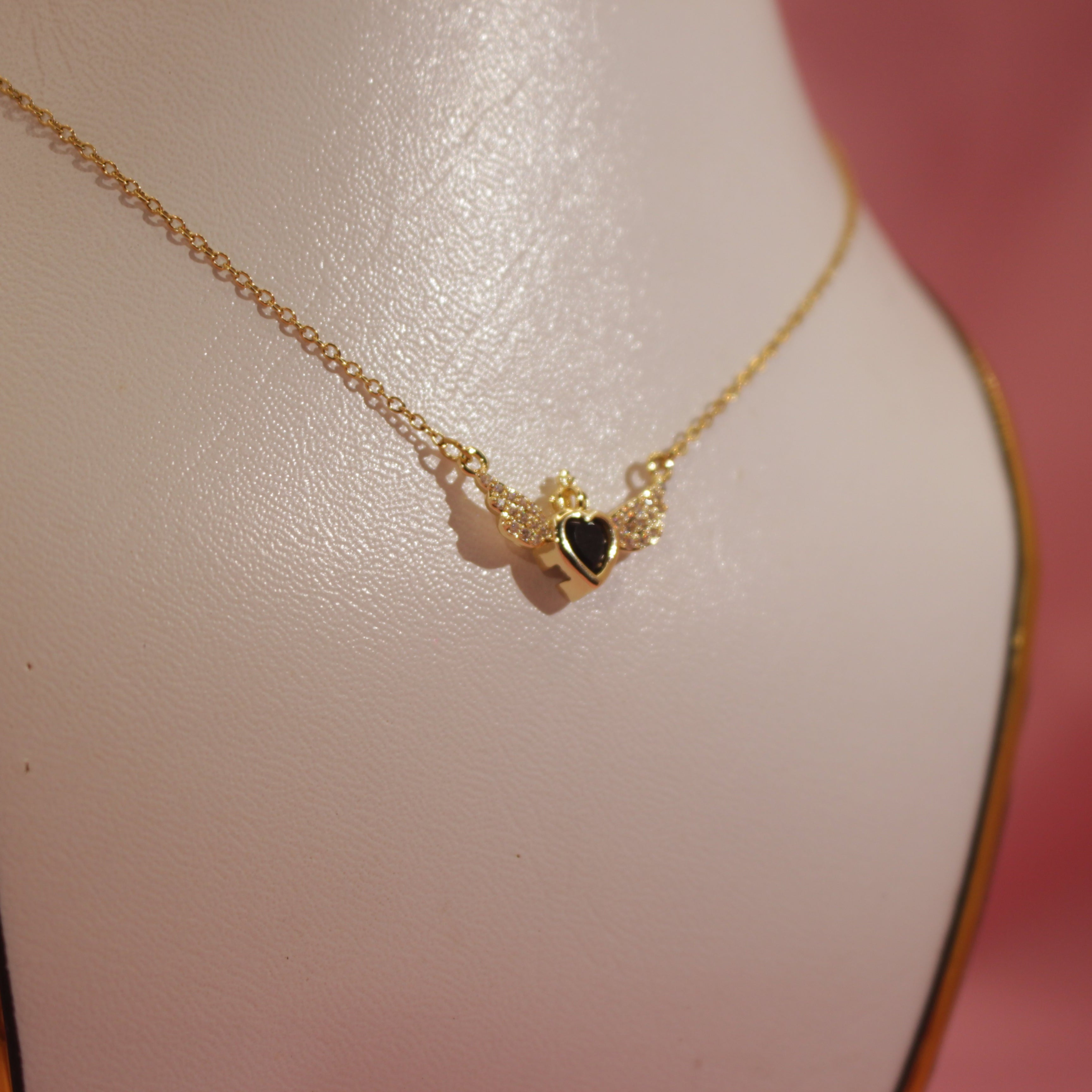 Emerald Winged Embrace Pendent Gold-Plated Elegance