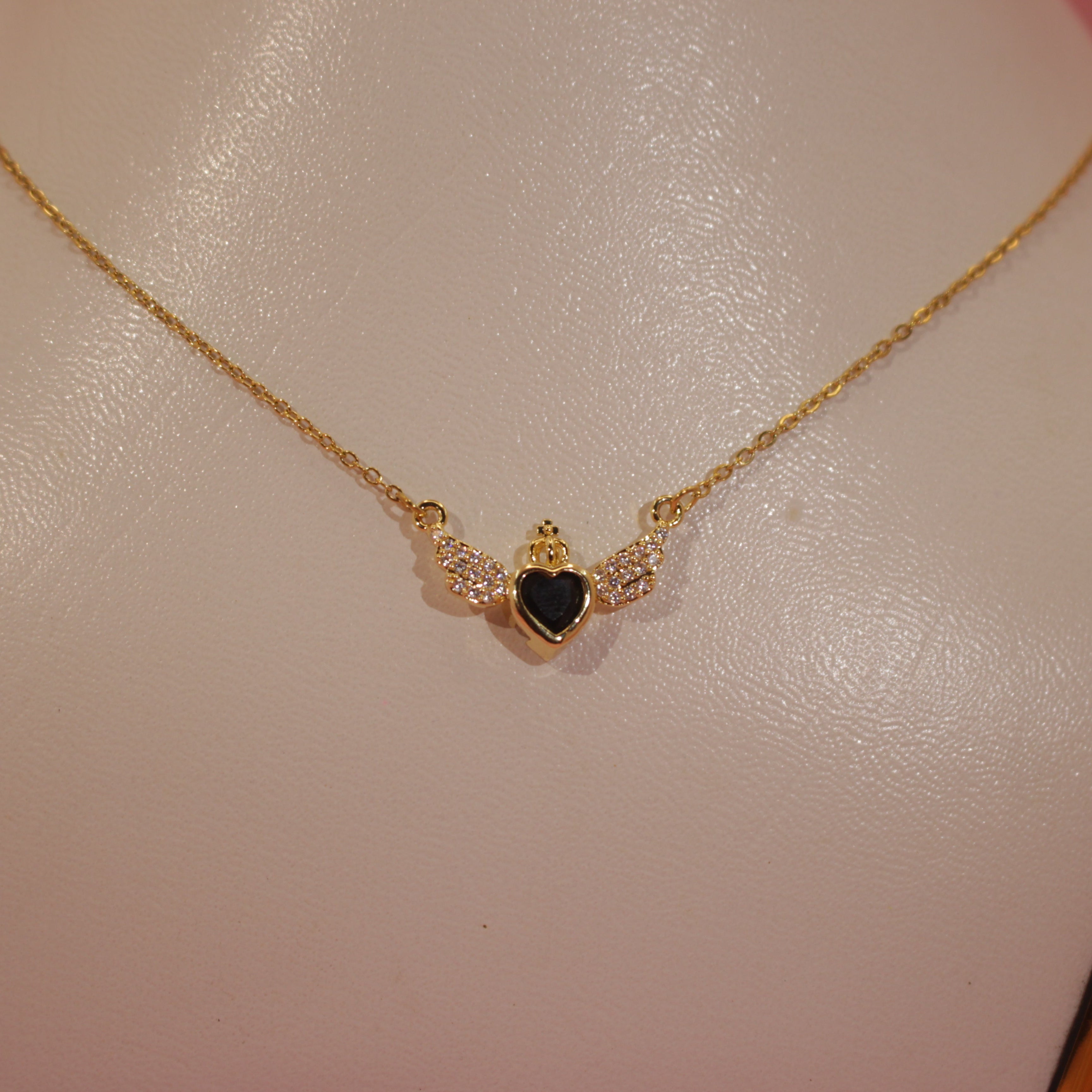 Emerald Winged Embrace Pendent Gold-Plated Elegance